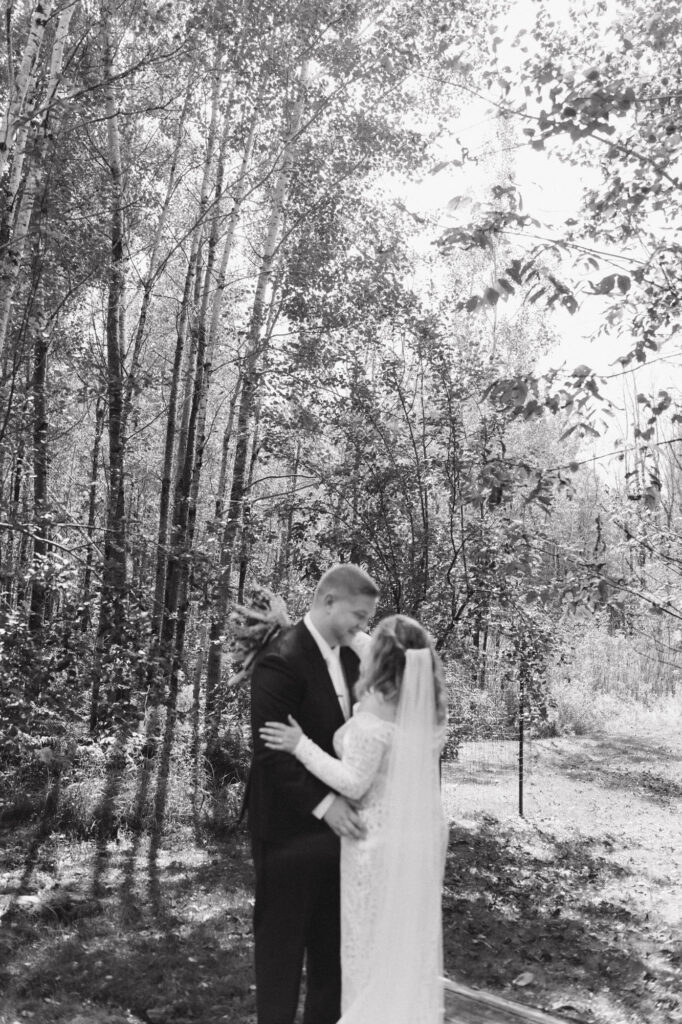 Black and white of grrom and bride