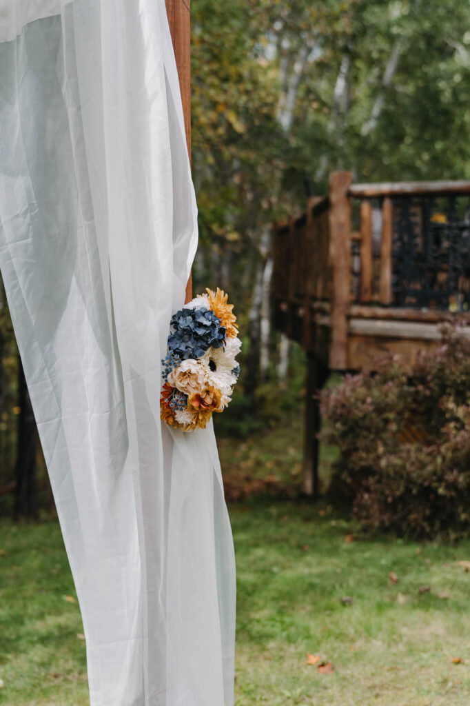 Flowers on wedding arch