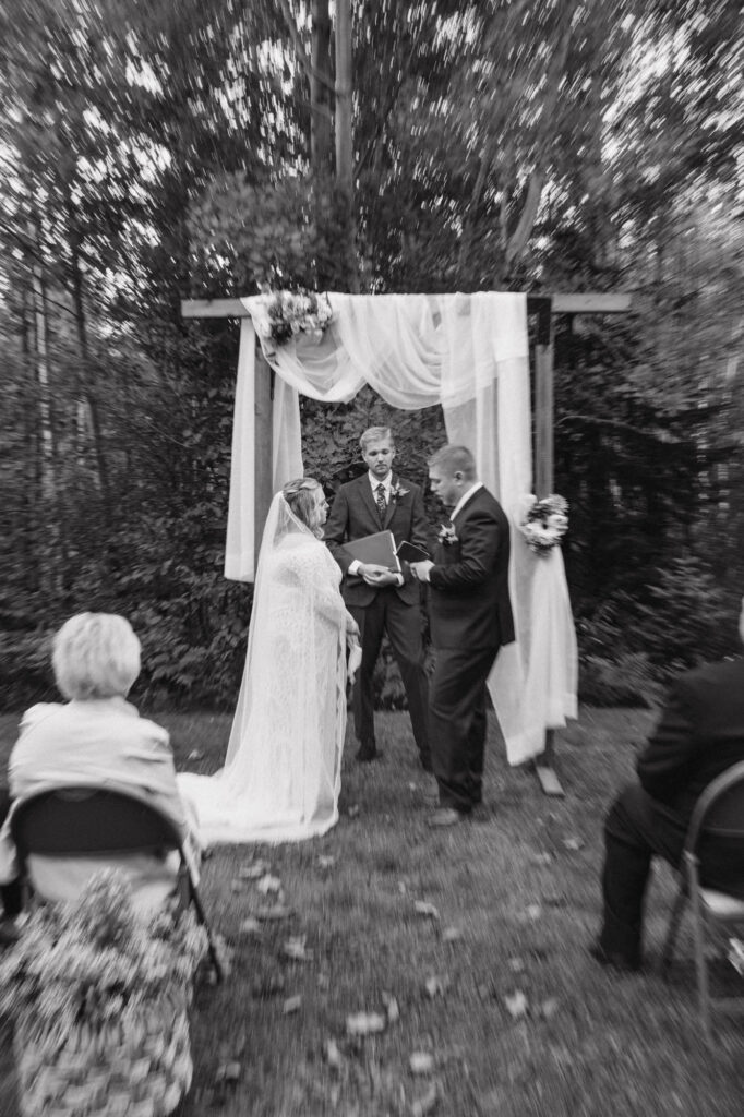 Black and white photo of groom and bride